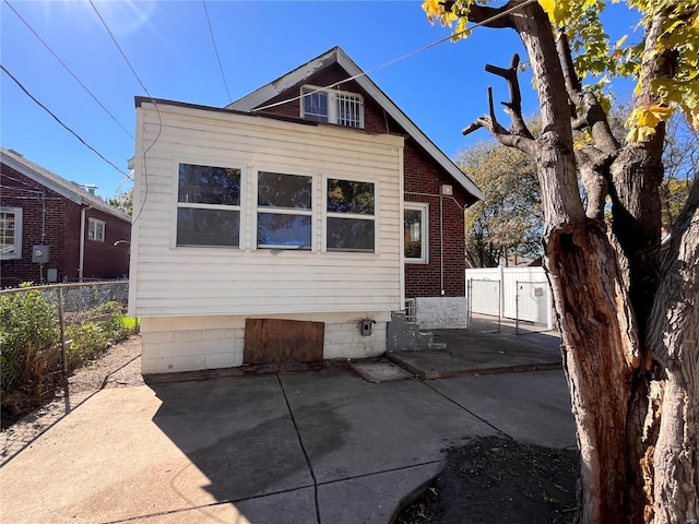 rear view of property with a patio