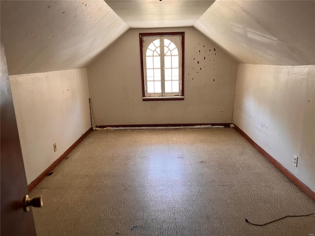 bonus room with vaulted ceiling