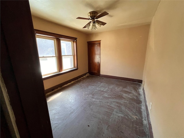 spare room with ceiling fan