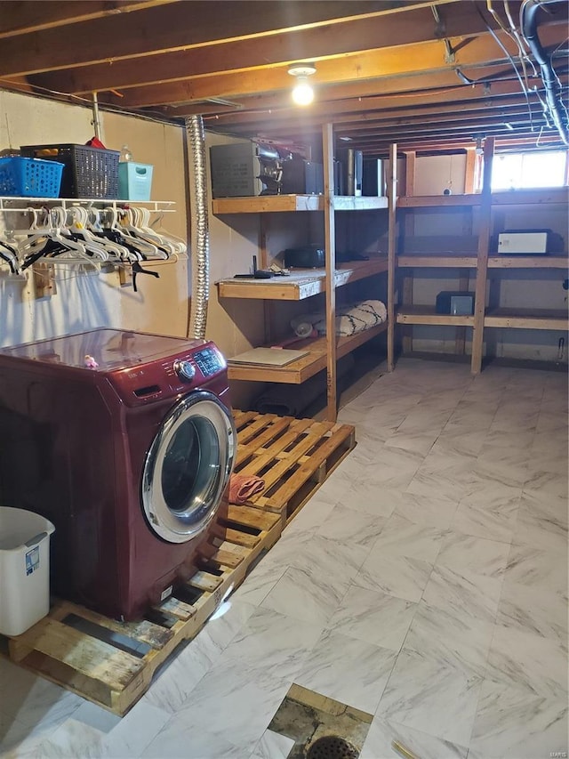 basement with washer / dryer