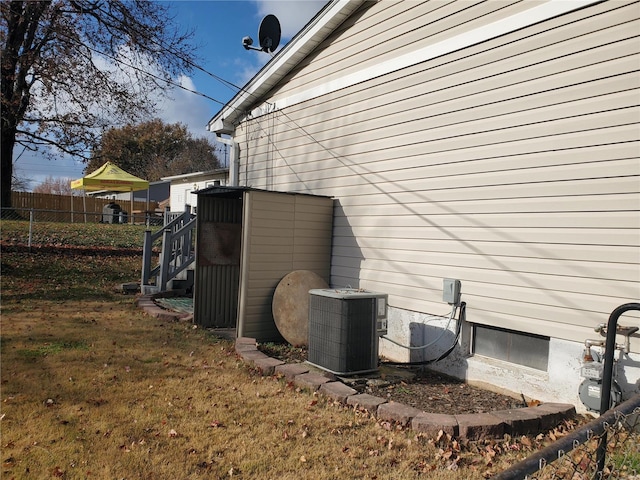 view of home's exterior featuring central AC unit