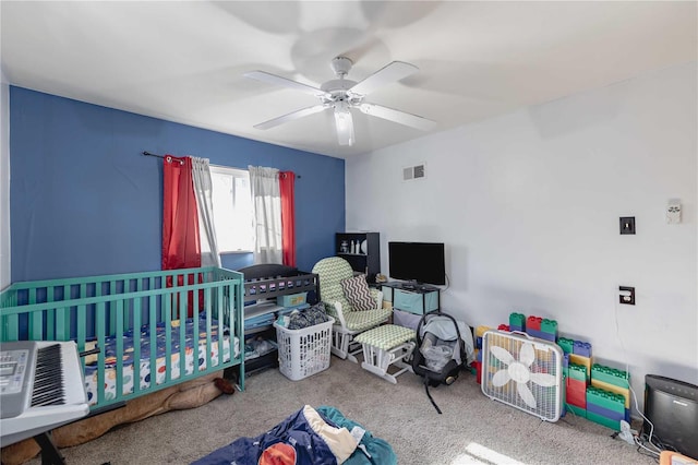 bedroom featuring ceiling fan, carpet flooring, and cooling unit