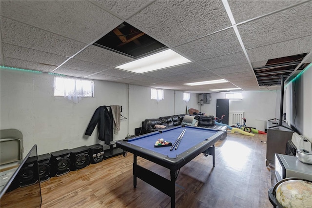 game room featuring hardwood / wood-style floors, billiards, and a drop ceiling