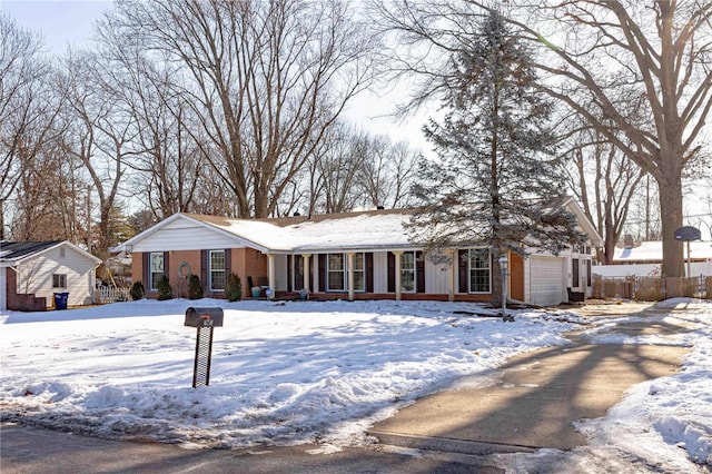 ranch-style house featuring a garage