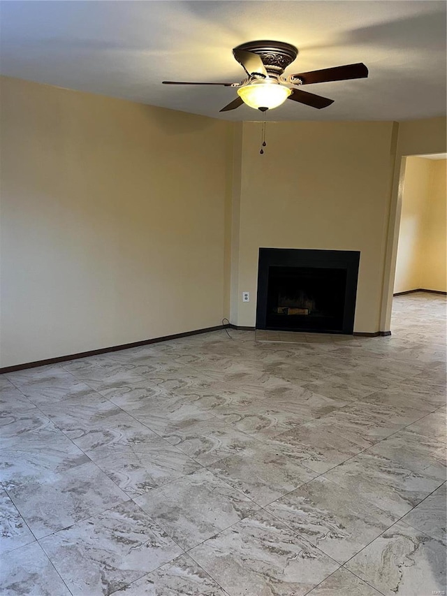 unfurnished living room featuring ceiling fan