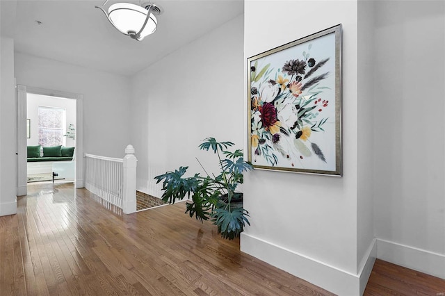 hallway featuring hardwood / wood-style floors