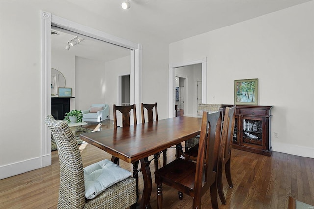 dining room featuring hardwood / wood-style flooring