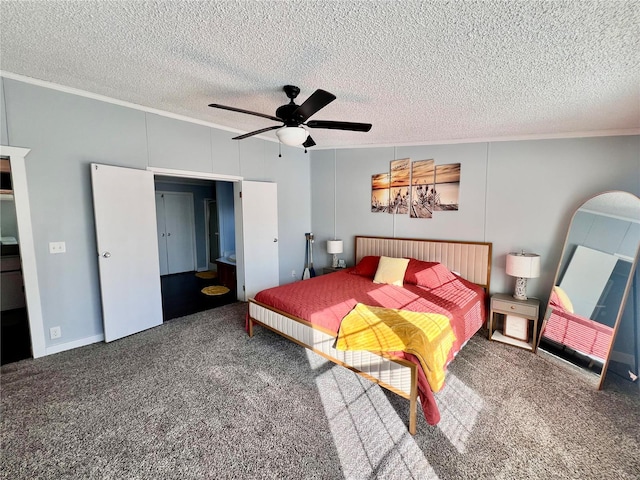 bedroom featuring ceiling fan, carpet, a textured ceiling, and ornamental molding