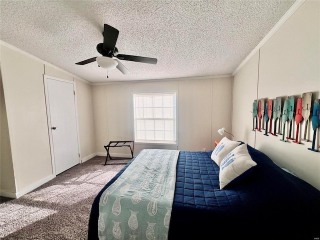 carpeted bedroom with ceiling fan, ornamental molding, and a textured ceiling