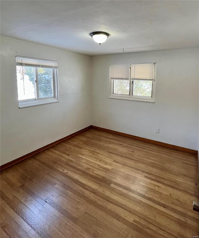 empty room featuring light hardwood / wood-style floors