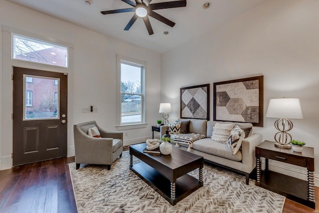 living room featuring hardwood / wood-style flooring and ceiling fan