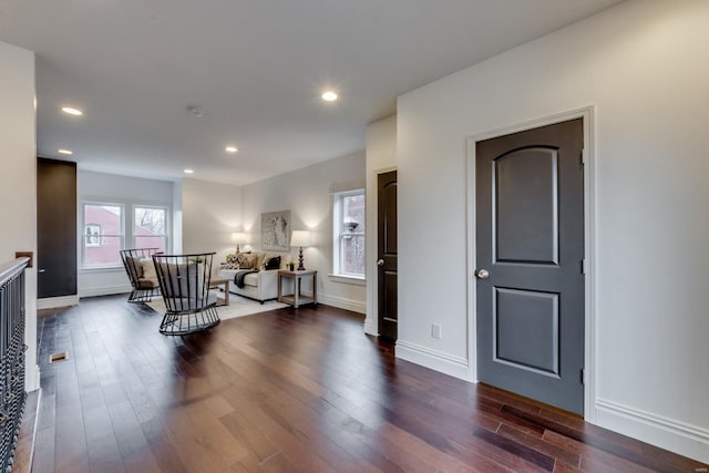 living room featuring dark hardwood / wood-style flooring