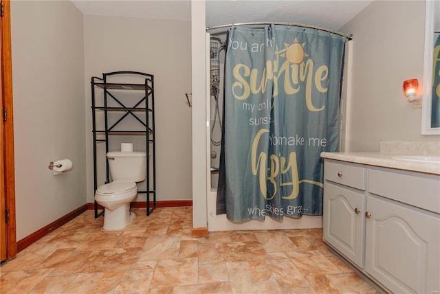 full bathroom with vanity, toilet, and shower / tub combo