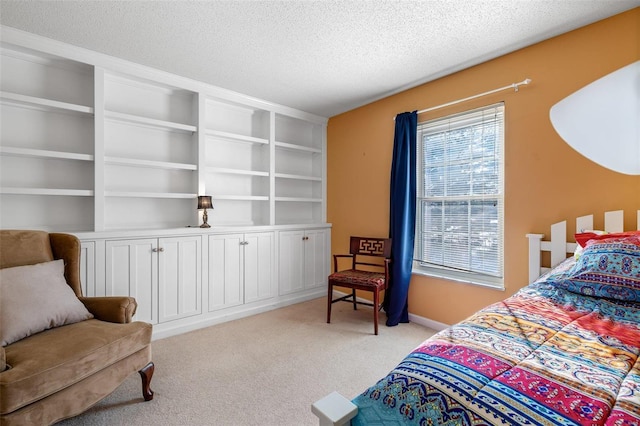 carpeted bedroom with a textured ceiling