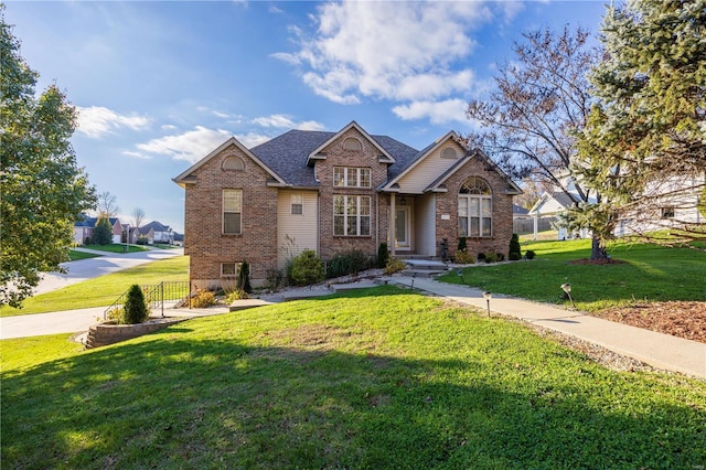 craftsman-style house featuring a front yard