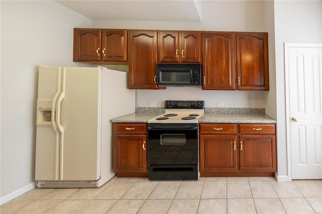 kitchen featuring black appliances and light tile patterned floors