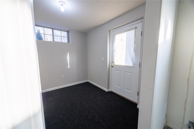 doorway featuring carpet flooring