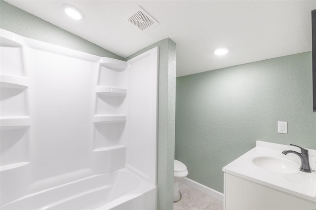 full bathroom featuring tub / shower combination, vanity, tile patterned flooring, toilet, and lofted ceiling