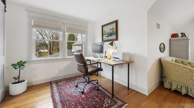 office space featuring light wood-type flooring