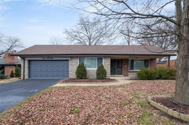 single story home featuring a garage