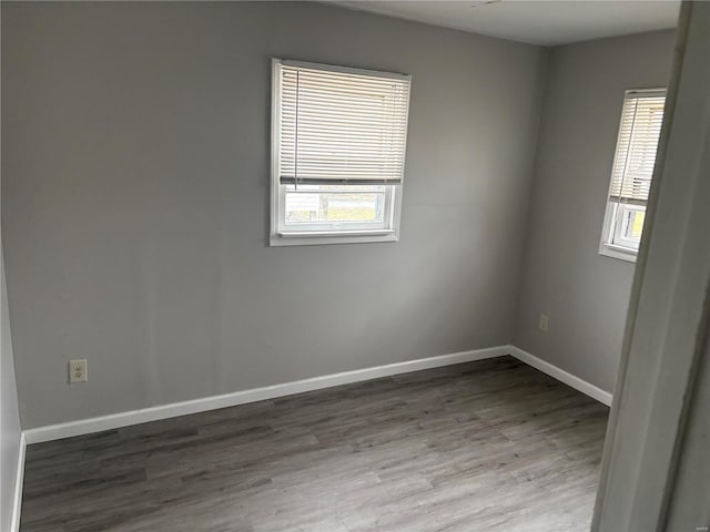 empty room featuring hardwood / wood-style flooring