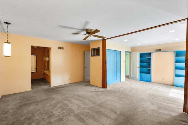 unfurnished room featuring carpet floors, recessed lighting, visible vents, and ceiling fan