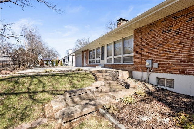 view of yard featuring an attached garage