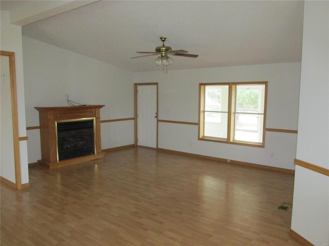 unfurnished living room with ceiling fan and light wood-type flooring