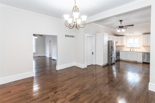 interior space with ornamental molding, ceiling fan with notable chandelier, vaulted ceiling, sink, and dark hardwood / wood-style floors