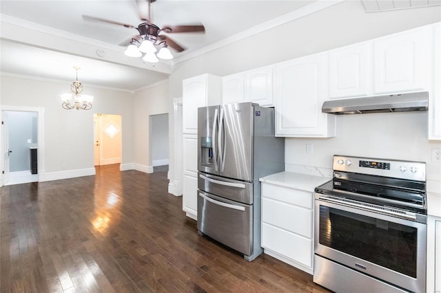 kitchen featuring dark wood-type flooring, stainless steel appliances, pendant lighting, white cabinets, and ceiling fan with notable chandelier