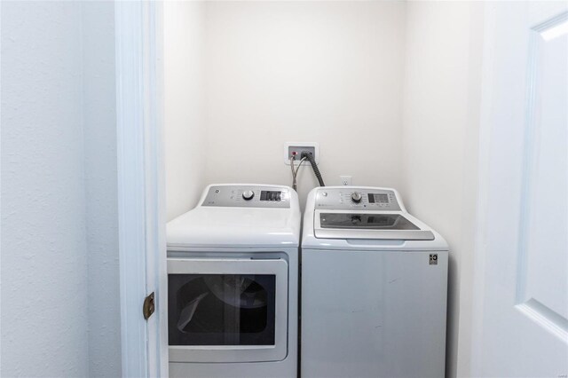 laundry room featuring independent washer and dryer