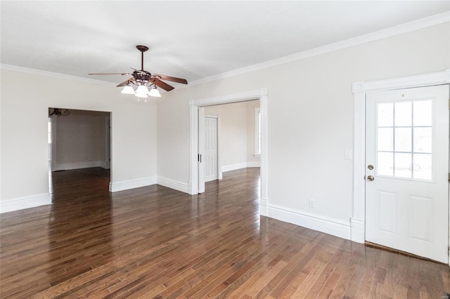 interior space with ceiling fan, crown molding, and dark wood-type flooring