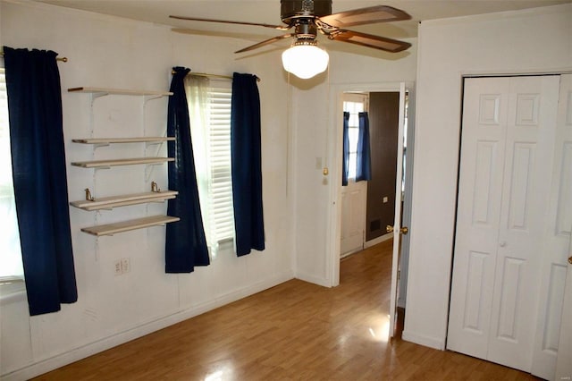 interior space featuring ceiling fan and light hardwood / wood-style floors