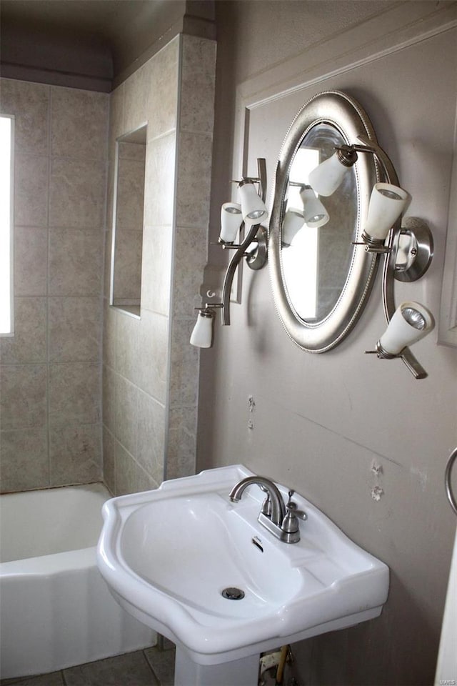 bathroom featuring tile patterned flooring and sink