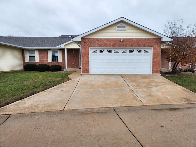 ranch-style home with a front yard and a garage