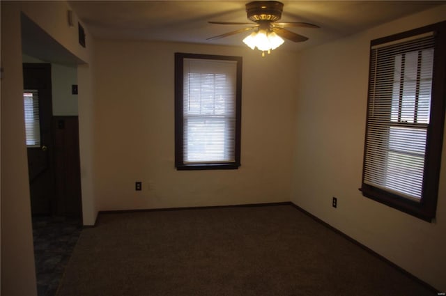 carpeted empty room with ceiling fan