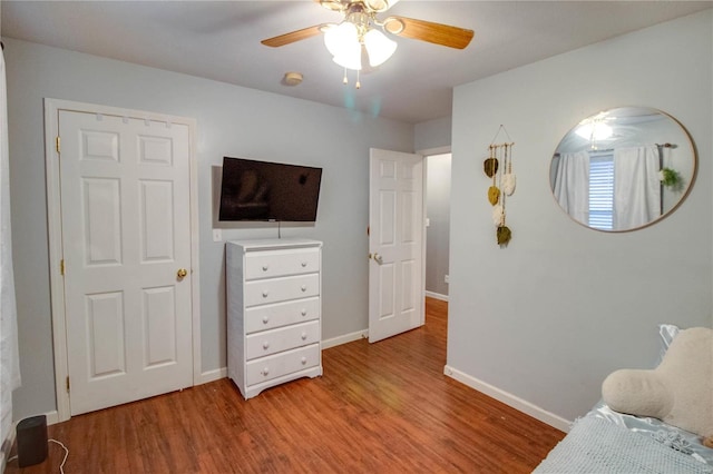 bedroom featuring ceiling fan and light hardwood / wood-style flooring