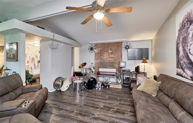 living room featuring ceiling fan, dark wood-type flooring, and vaulted ceiling