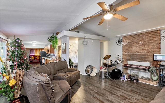 living room with ceiling fan, dark hardwood / wood-style flooring, and vaulted ceiling