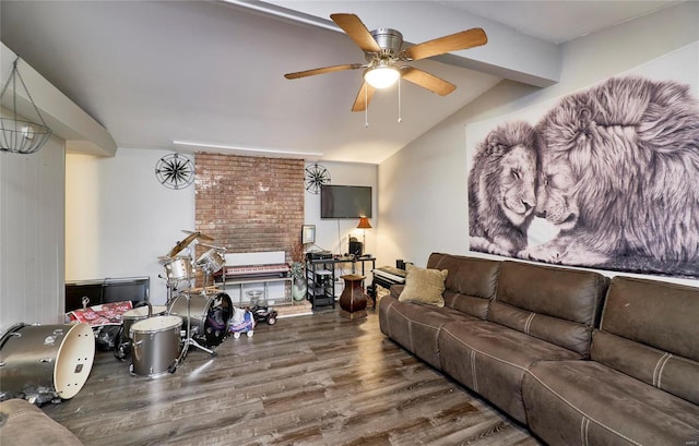 living room with vaulted ceiling with beams, ceiling fan, and dark wood-type flooring