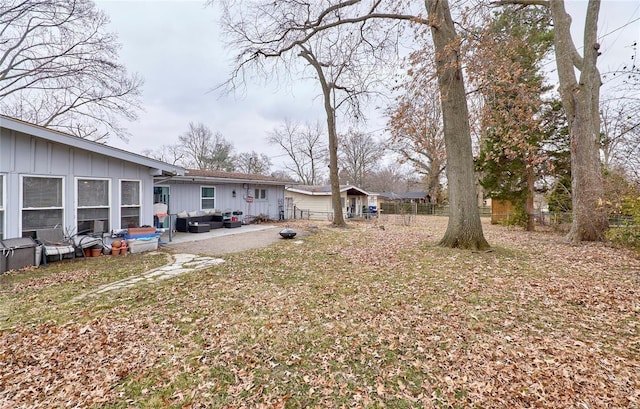 view of yard with outdoor lounge area and a patio area