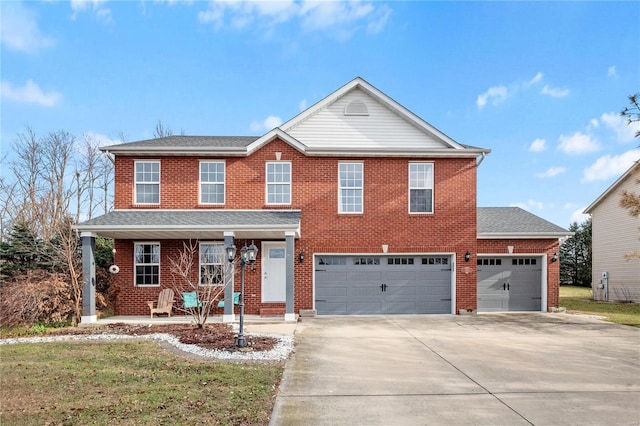 view of front facade featuring a front lawn and a garage