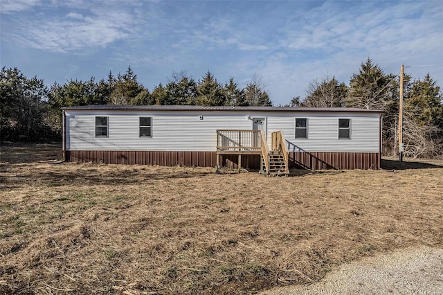 view of front of property with a deck