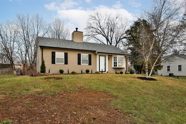 ranch-style house with a front lawn