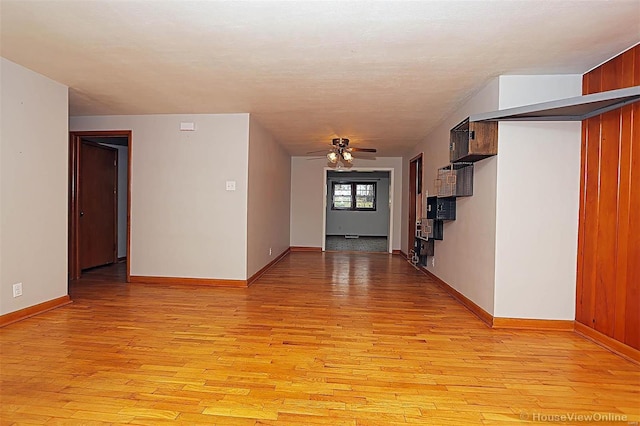 corridor with light wood-type flooring