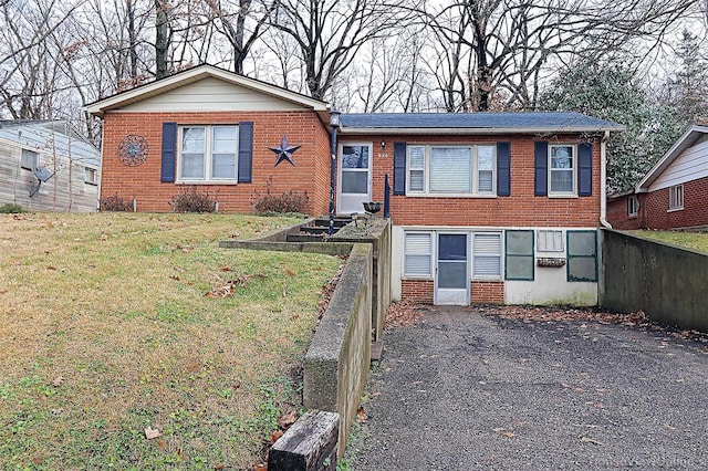 view of front of property with a front lawn