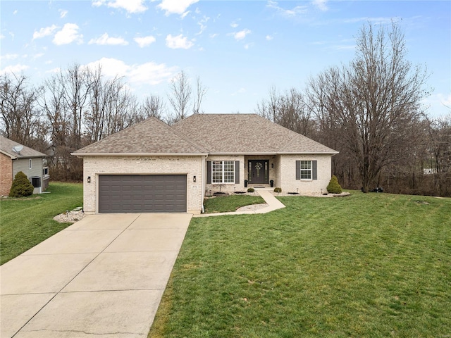 ranch-style home featuring a front yard and a garage