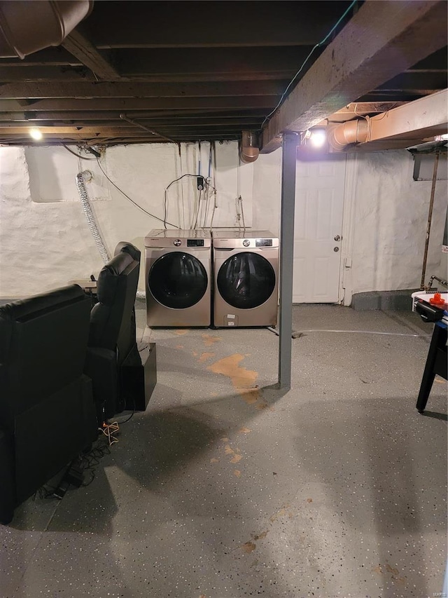 basement with separate washer and dryer