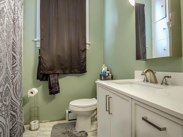 full bathroom with toilet, baseboard heating, and vanity