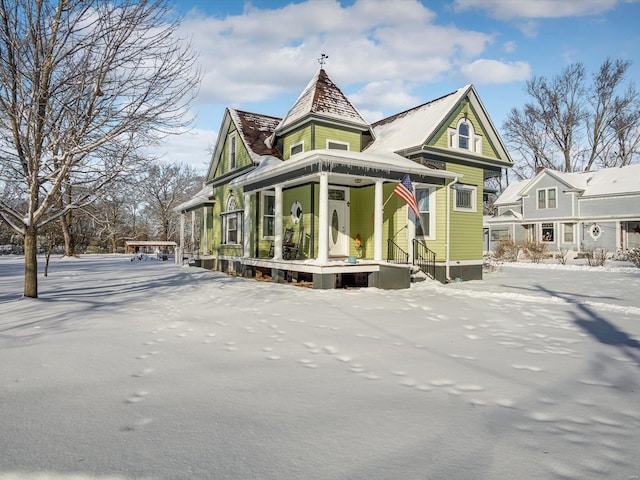 view of snow covered property